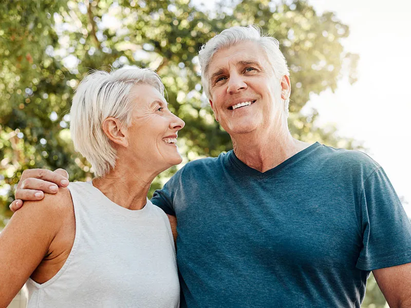 couple smiling outdoors